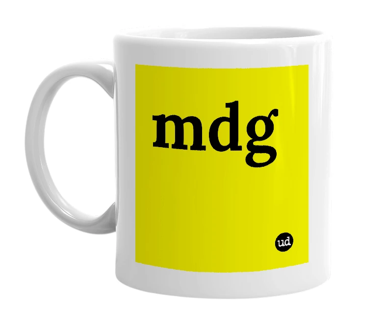 White mug with 'mdg' in bold black letters