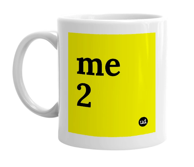White mug with 'me 2' in bold black letters