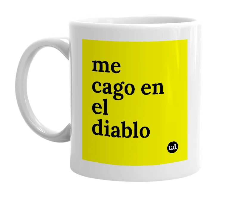 White mug with 'me cago en el diablo' in bold black letters
