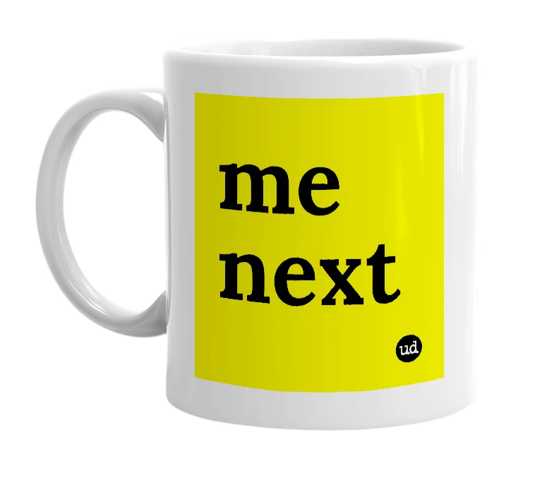 White mug with 'me next' in bold black letters