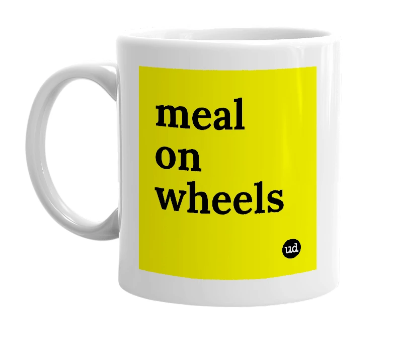 White mug with 'meal on wheels' in bold black letters