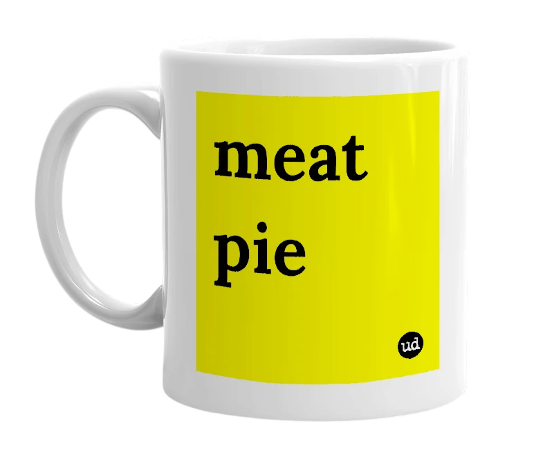 White mug with 'meat pie' in bold black letters