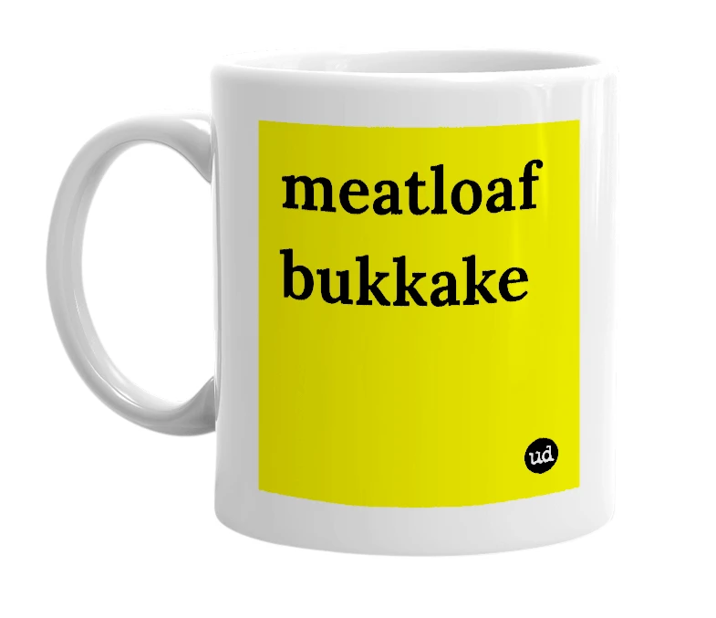 White mug with 'meatloaf bukkake' in bold black letters