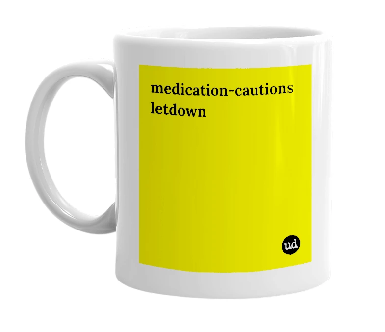 White mug with 'medication-cautions letdown' in bold black letters