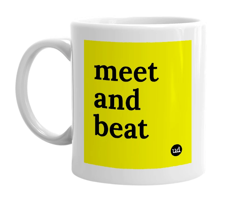 White mug with 'meet and beat' in bold black letters