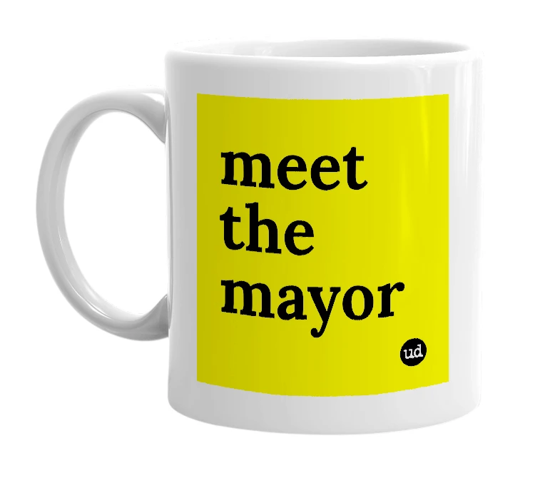 White mug with 'meet the mayor' in bold black letters