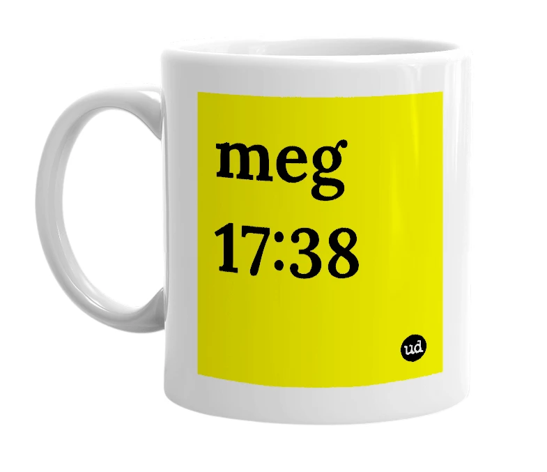 White mug with 'meg 17:38' in bold black letters