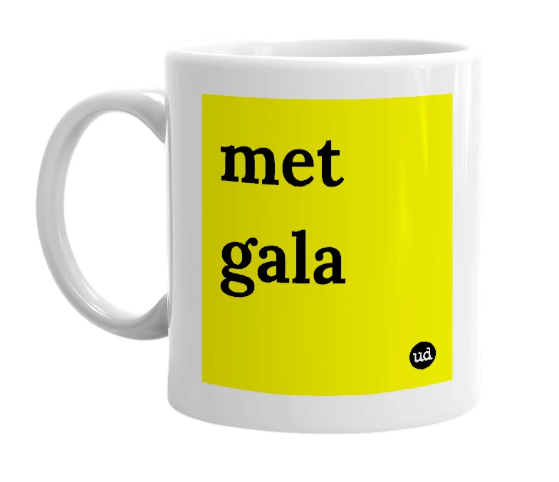 White mug with 'met gala' in bold black letters