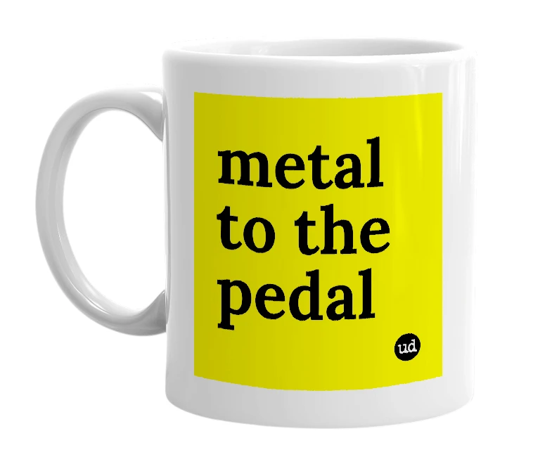 White mug with 'metal to the pedal' in bold black letters