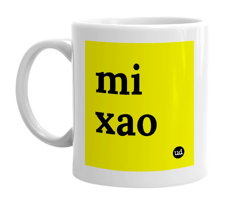 White mug with 'mi xao' in bold black letters