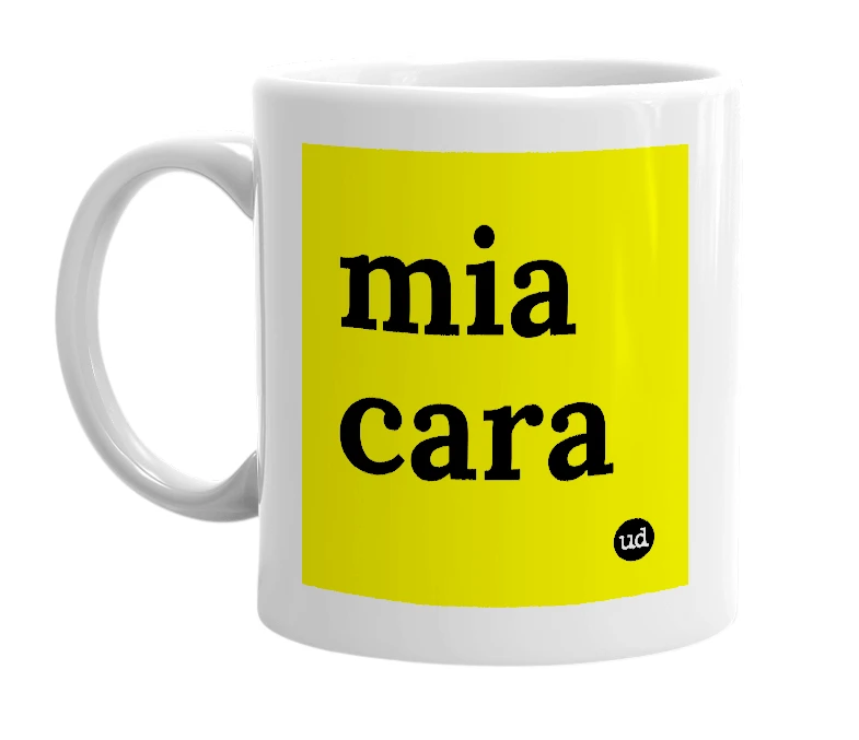 White mug with 'mia cara' in bold black letters