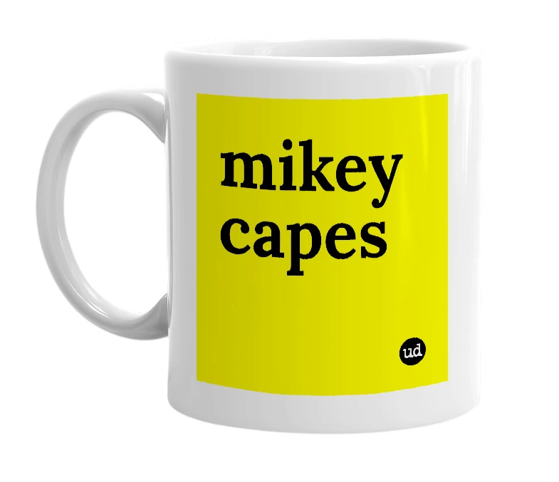 White mug with 'mikey capes' in bold black letters