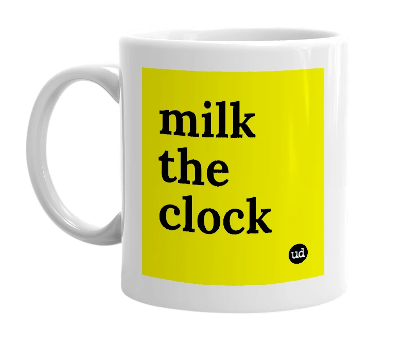 White mug with 'milk the clock' in bold black letters