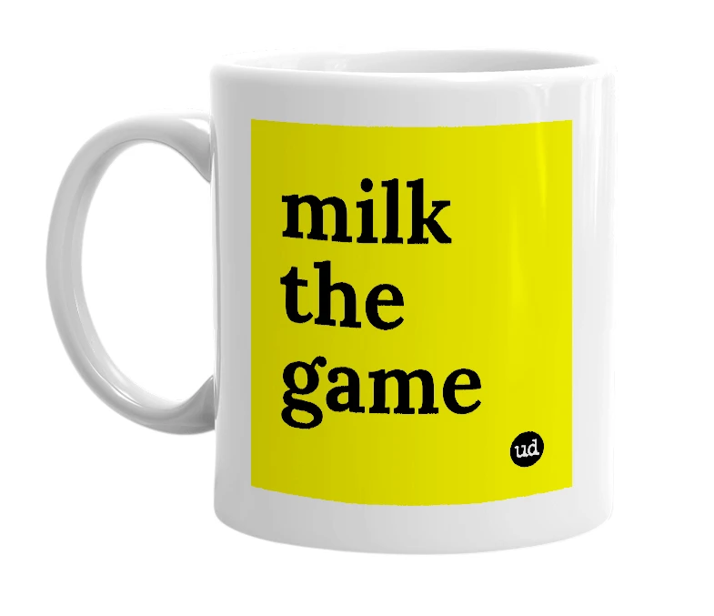 White mug with 'milk the game' in bold black letters