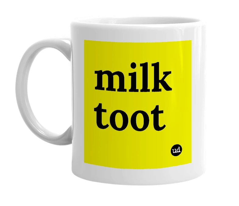 White mug with 'milk toot' in bold black letters
