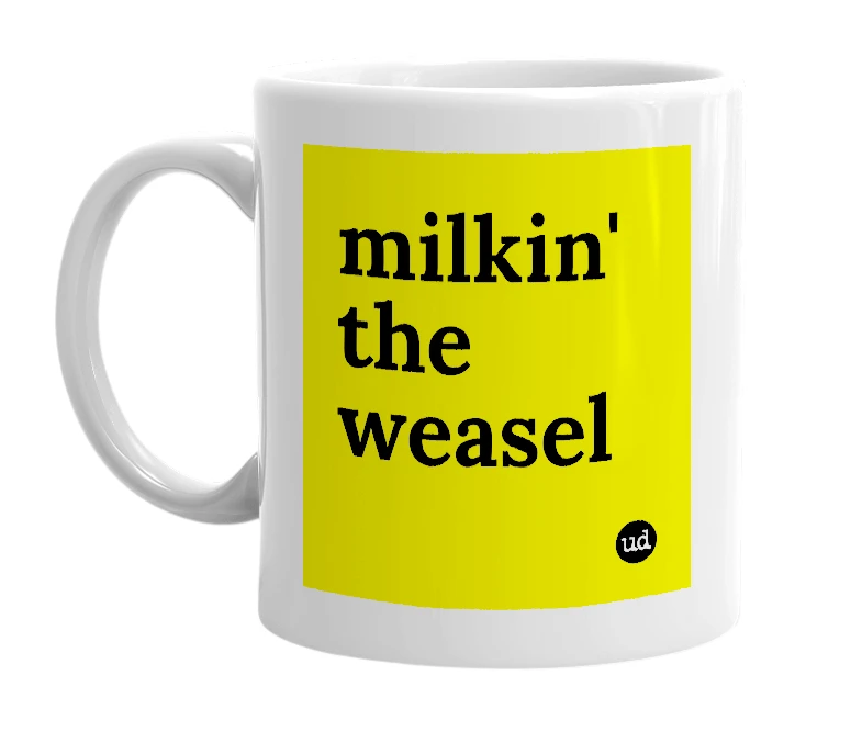 White mug with 'milkin' the weasel' in bold black letters
