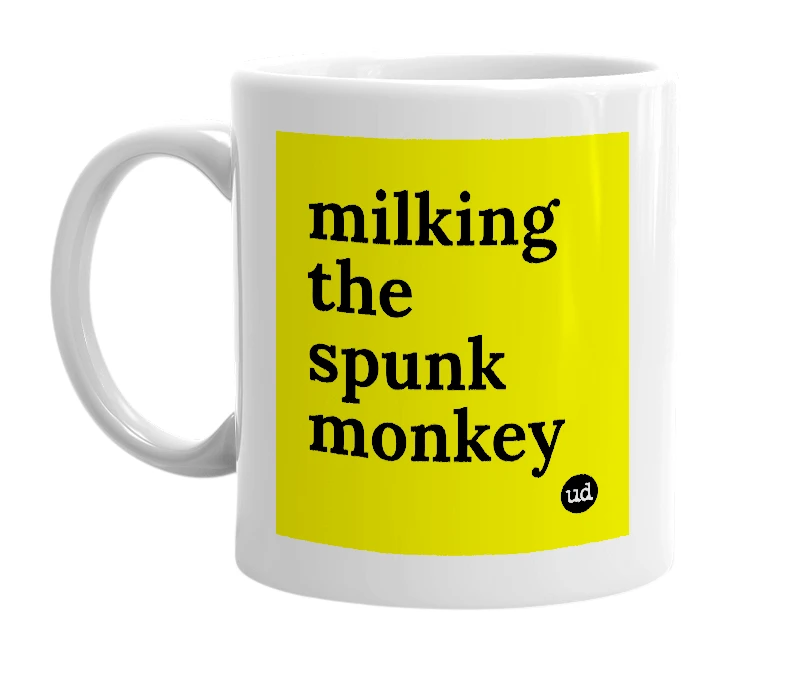 White mug with 'milking the spunk monkey' in bold black letters
