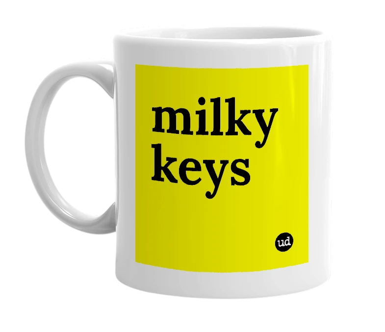 White mug with 'milky keys' in bold black letters