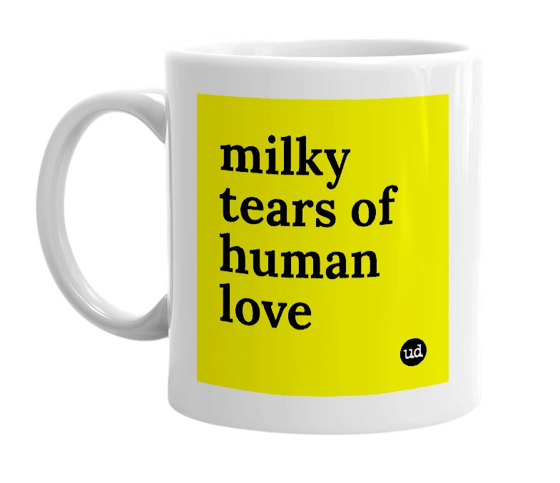 White mug with 'milky tears of human love' in bold black letters