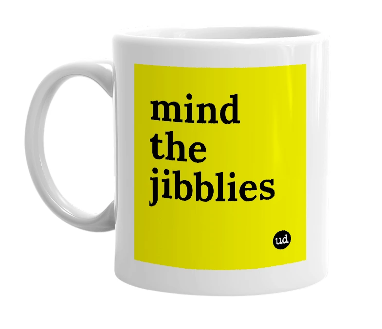 White mug with 'mind the jibblies' in bold black letters