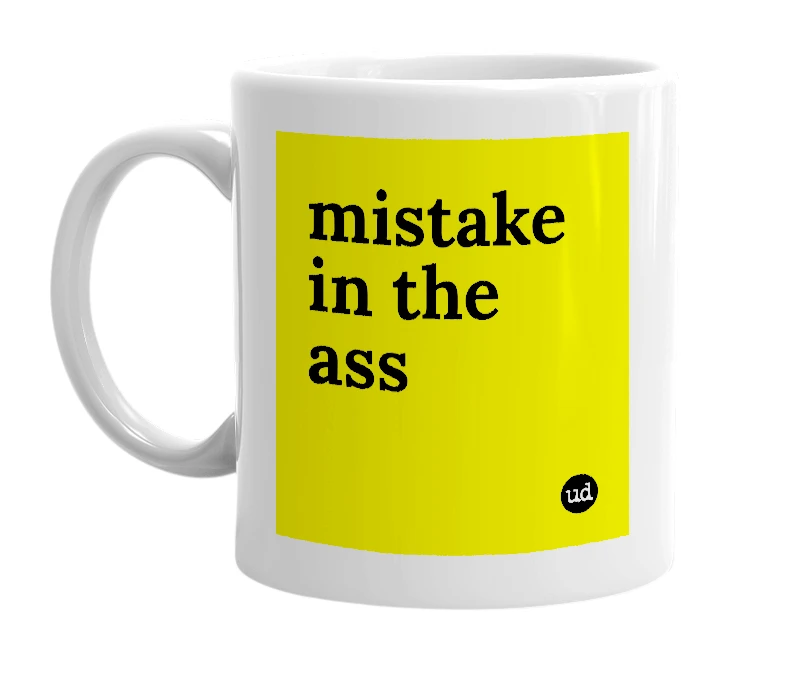 White mug with 'mistake in the ass' in bold black letters