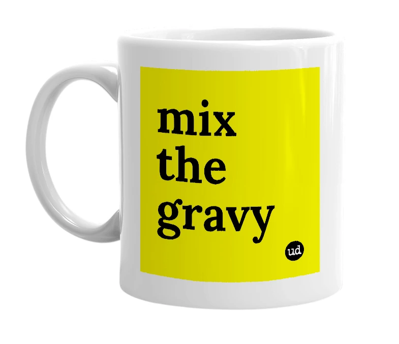 White mug with 'mix the gravy' in bold black letters
