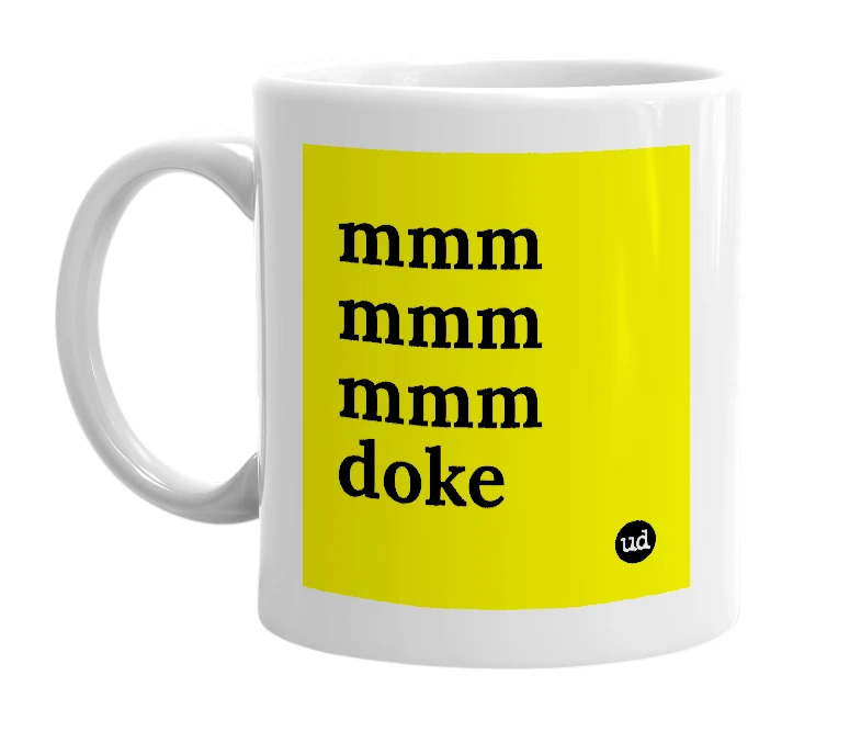 White mug with 'mmm mmm mmm doke' in bold black letters