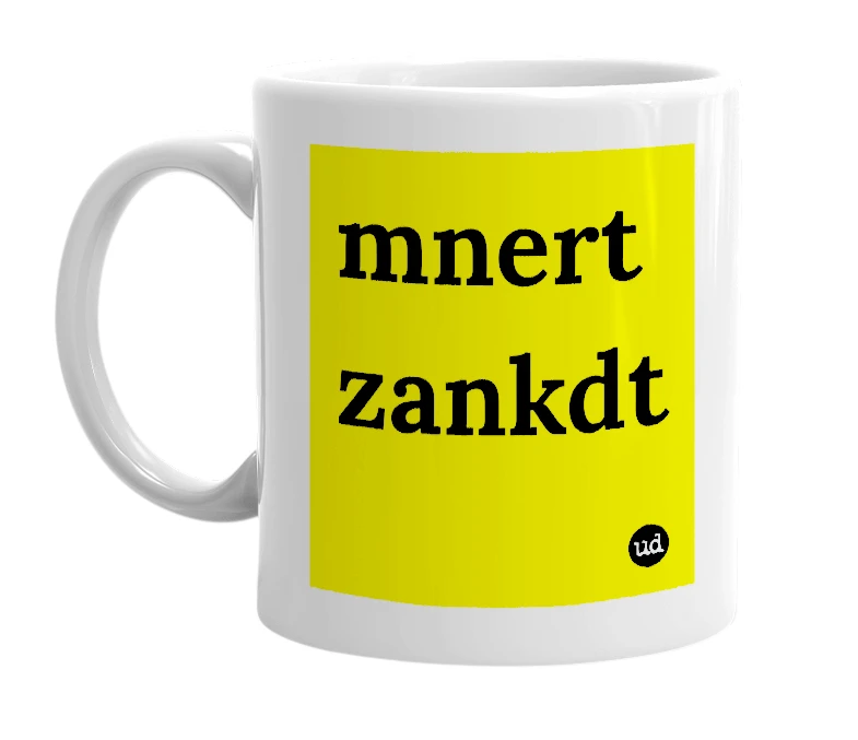 White mug with 'mnert zankdt' in bold black letters