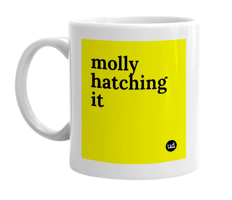 White mug with 'molly hatching it' in bold black letters