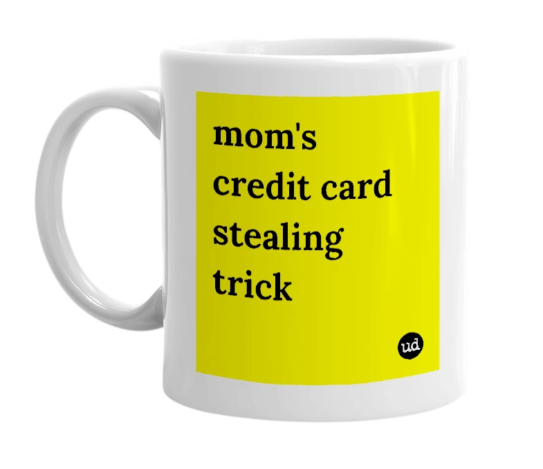 White mug with 'mom's credit card stealing trick' in bold black letters