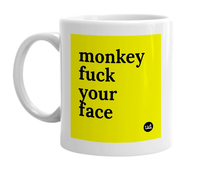 White mug with 'monkey fuck your face' in bold black letters