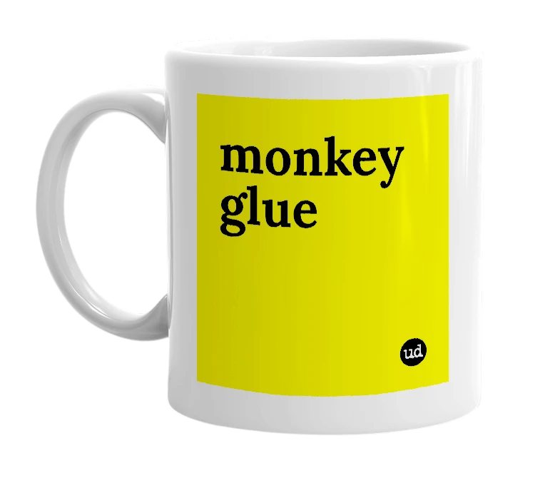 White mug with 'monkey glue' in bold black letters