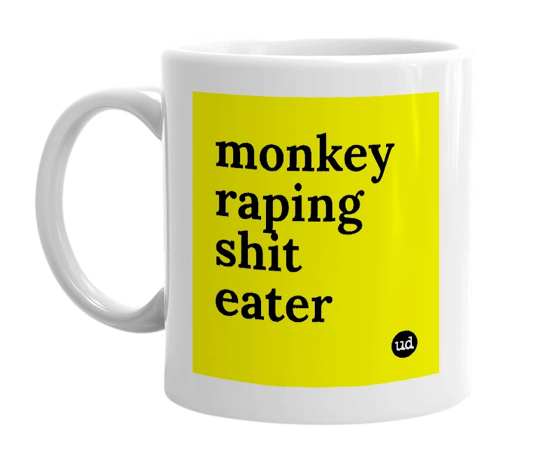 White mug with 'monkey raping shit eater' in bold black letters