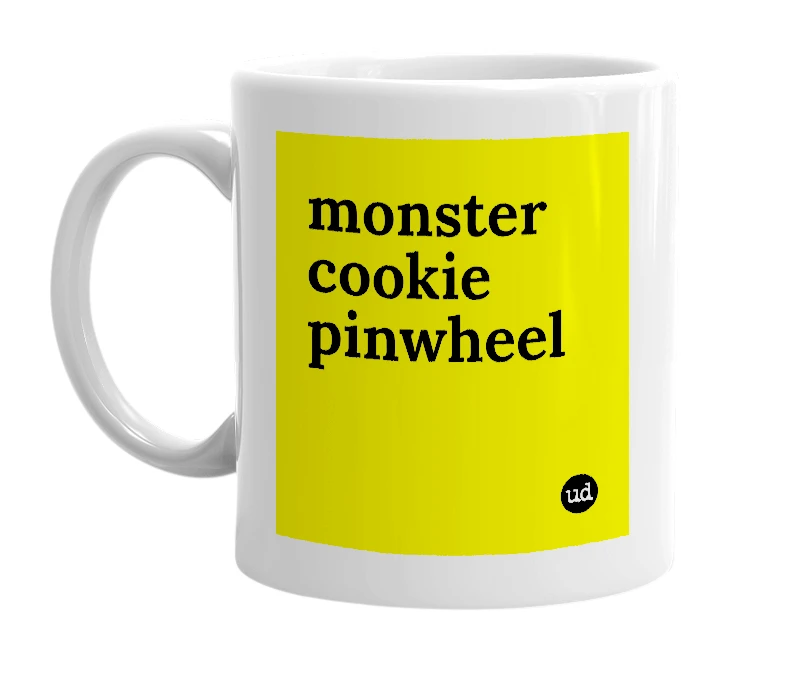 White mug with 'monster cookie pinwheel' in bold black letters