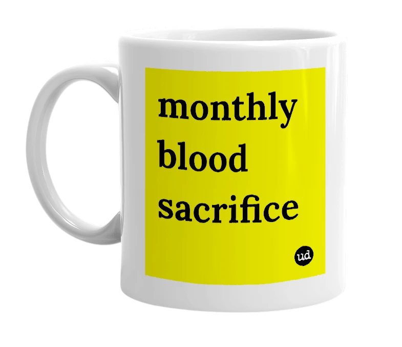 White mug with 'monthly blood sacrifice' in bold black letters