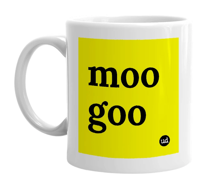 White mug with 'moo goo' in bold black letters
