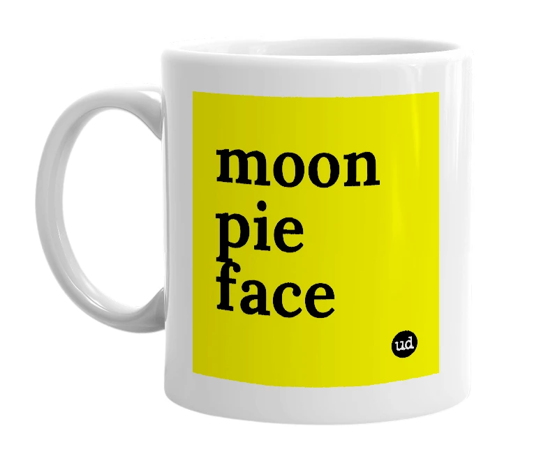 White mug with 'moon pie face' in bold black letters