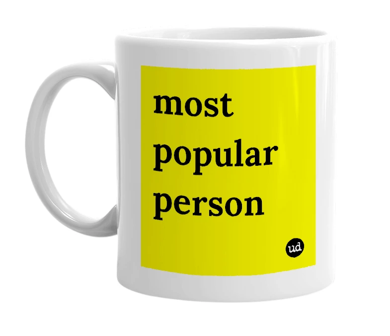 White mug with 'most popular person' in bold black letters