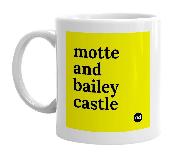 White mug with 'motte and bailey castle' in bold black letters