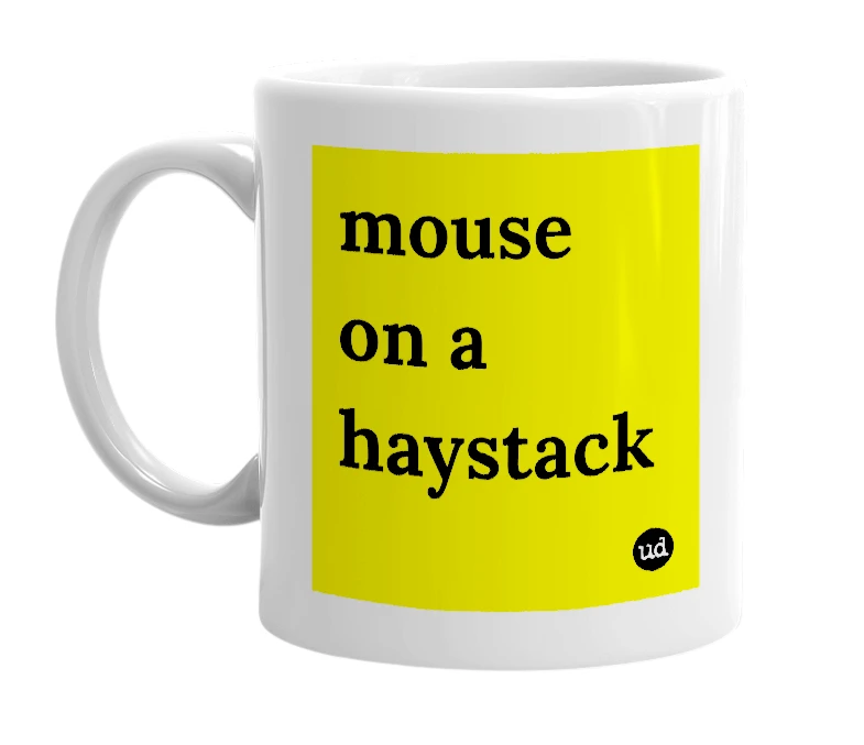 White mug with 'mouse on a haystack' in bold black letters