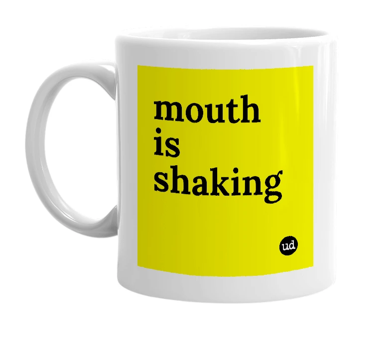 White mug with 'mouth is shaking' in bold black letters