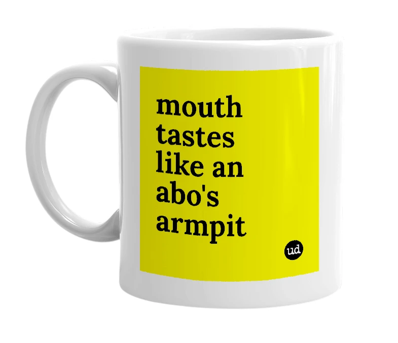 White mug with 'mouth tastes like an abo's armpit' in bold black letters