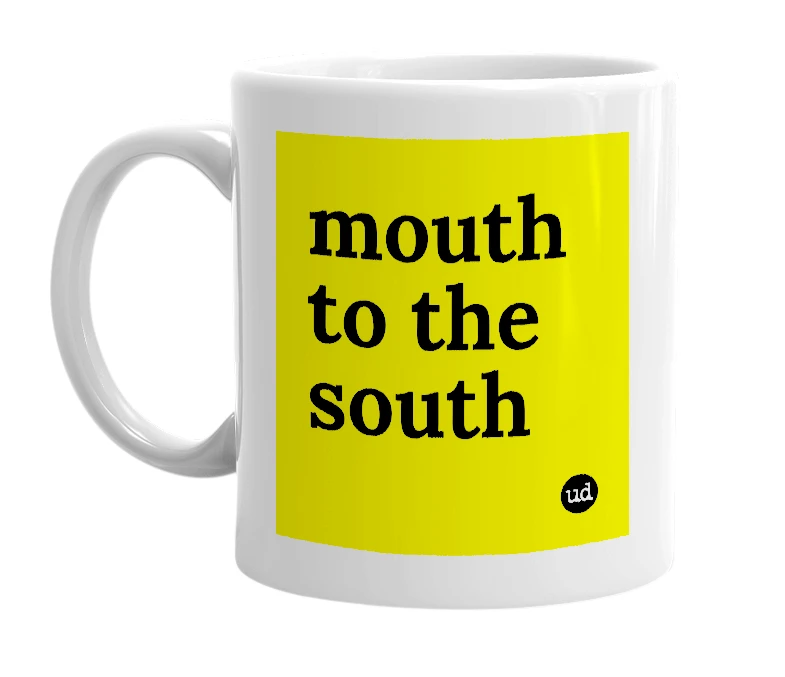 White mug with 'mouth to the south' in bold black letters