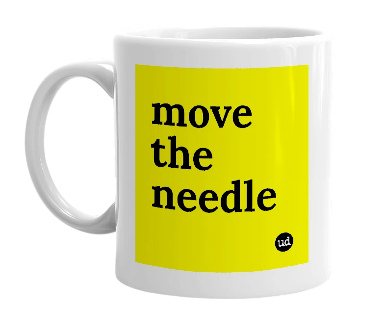 White mug with 'move the needle' in bold black letters