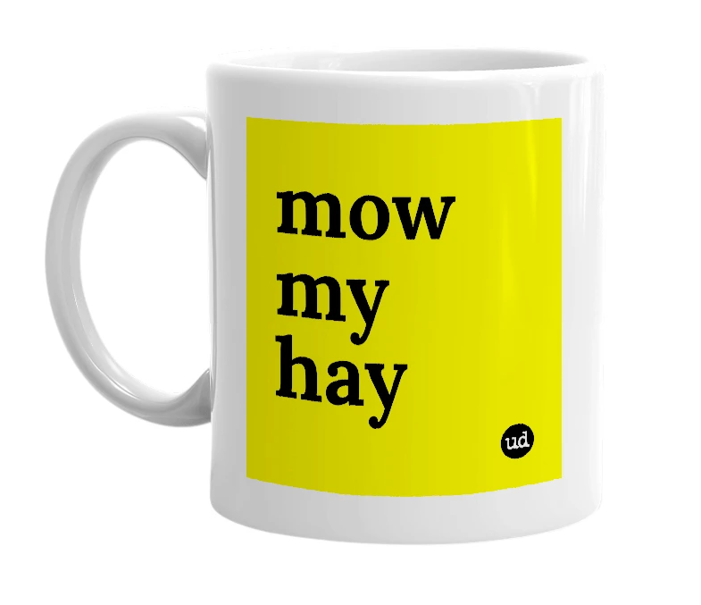 White mug with 'mow my hay' in bold black letters