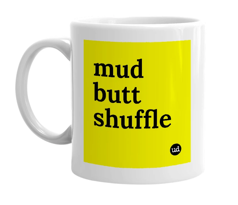 White mug with 'mud butt shuffle' in bold black letters