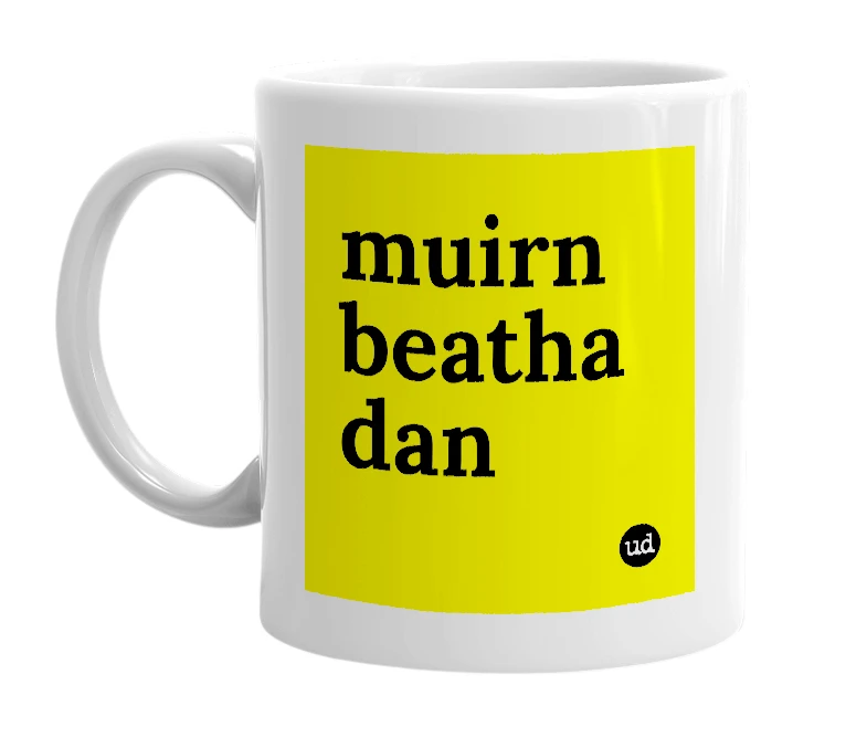 White mug with 'muirn beatha dan' in bold black letters