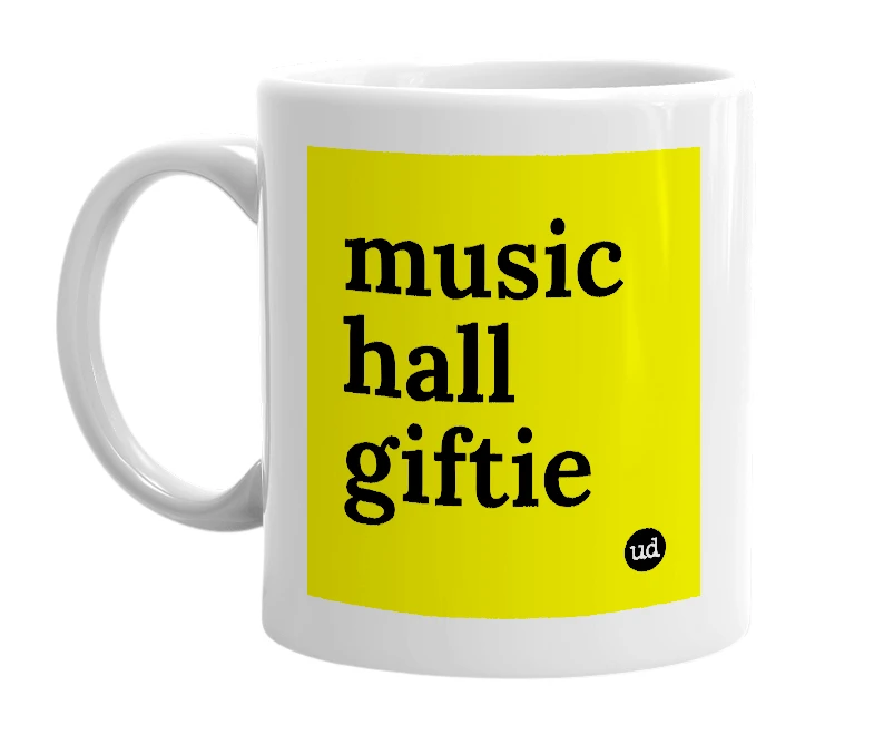White mug with 'music hall giftie' in bold black letters