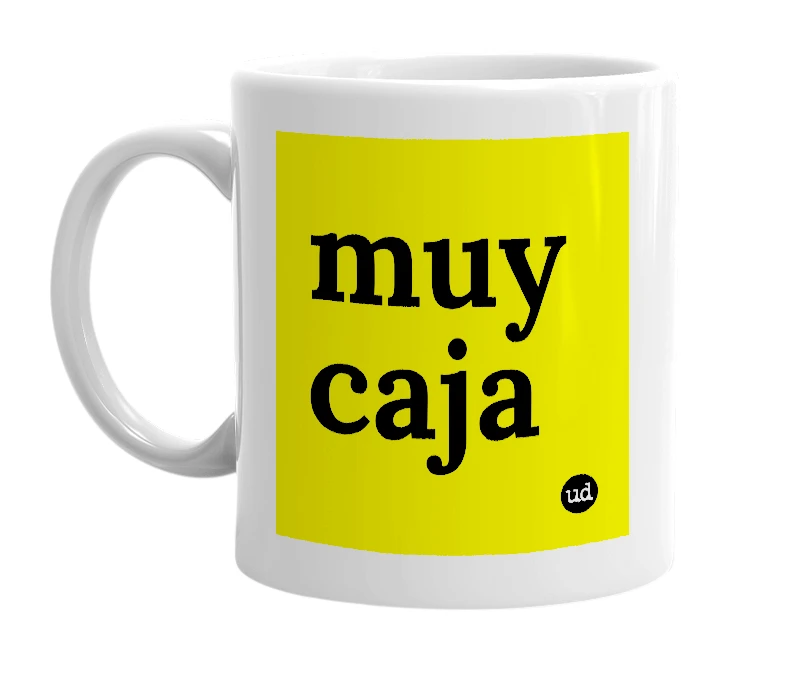 White mug with 'muy caja' in bold black letters
