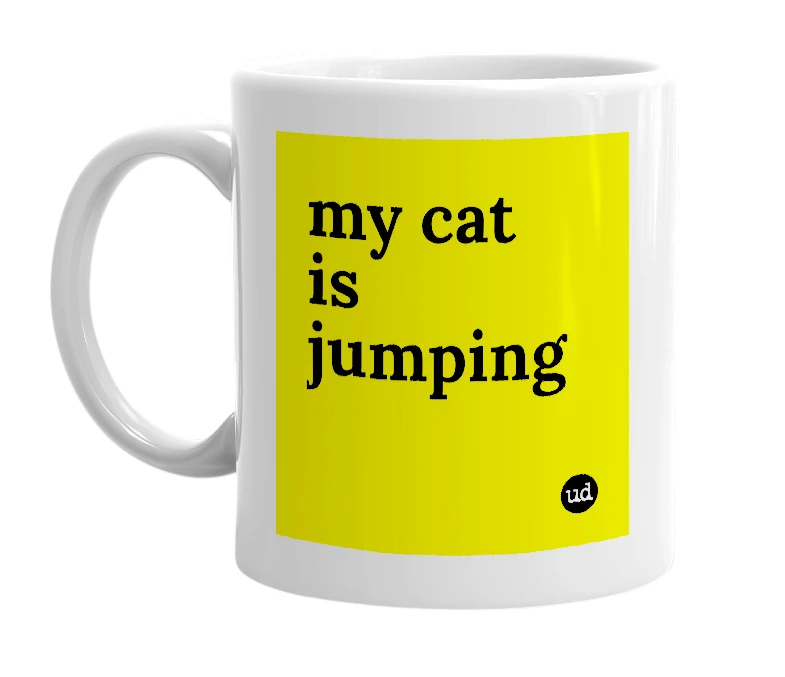 White mug with 'my cat is jumping' in bold black letters
